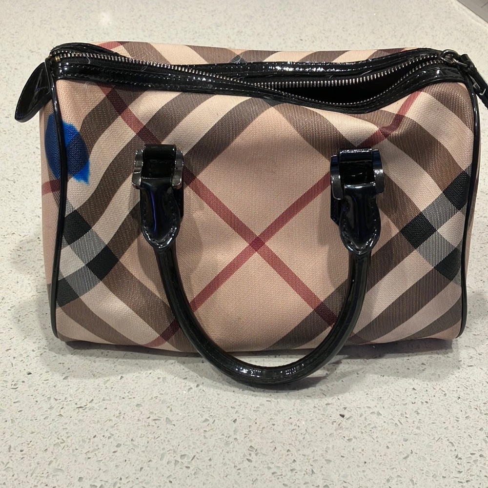 Used and stained authentic Burberry Purse